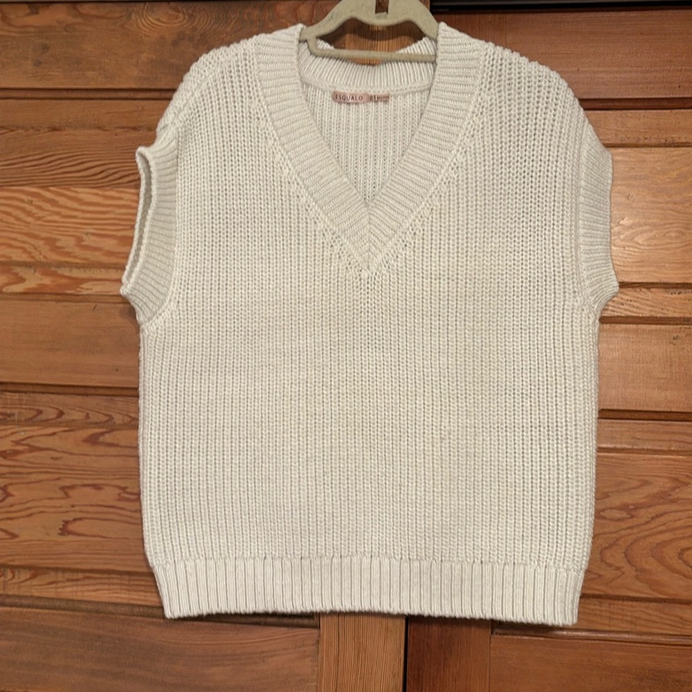 White sweater vest
